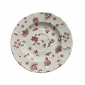Vintage pink floral vine ceramic plate with scalloped edge, white background