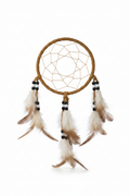 Native American dreamcatcher with tan hoop, woven web, beads and natural feathers on white background
