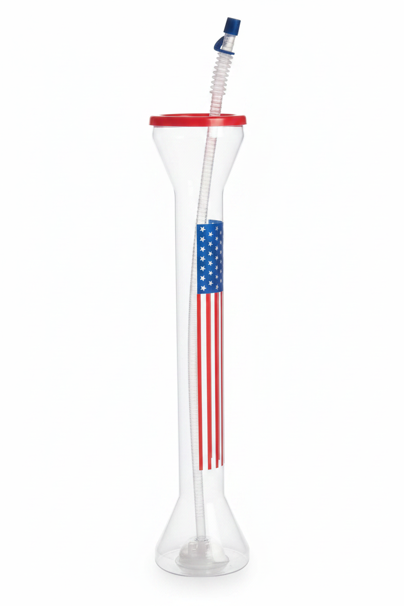 Tall clear patriotic yard cup with American flag design, red lid and blue straw on white background